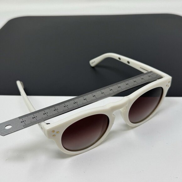 Prive Revaux The Expressionist C100 polarized white round frame sunglasses main image 9